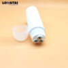 plastic tube with three roller ball massage applicator